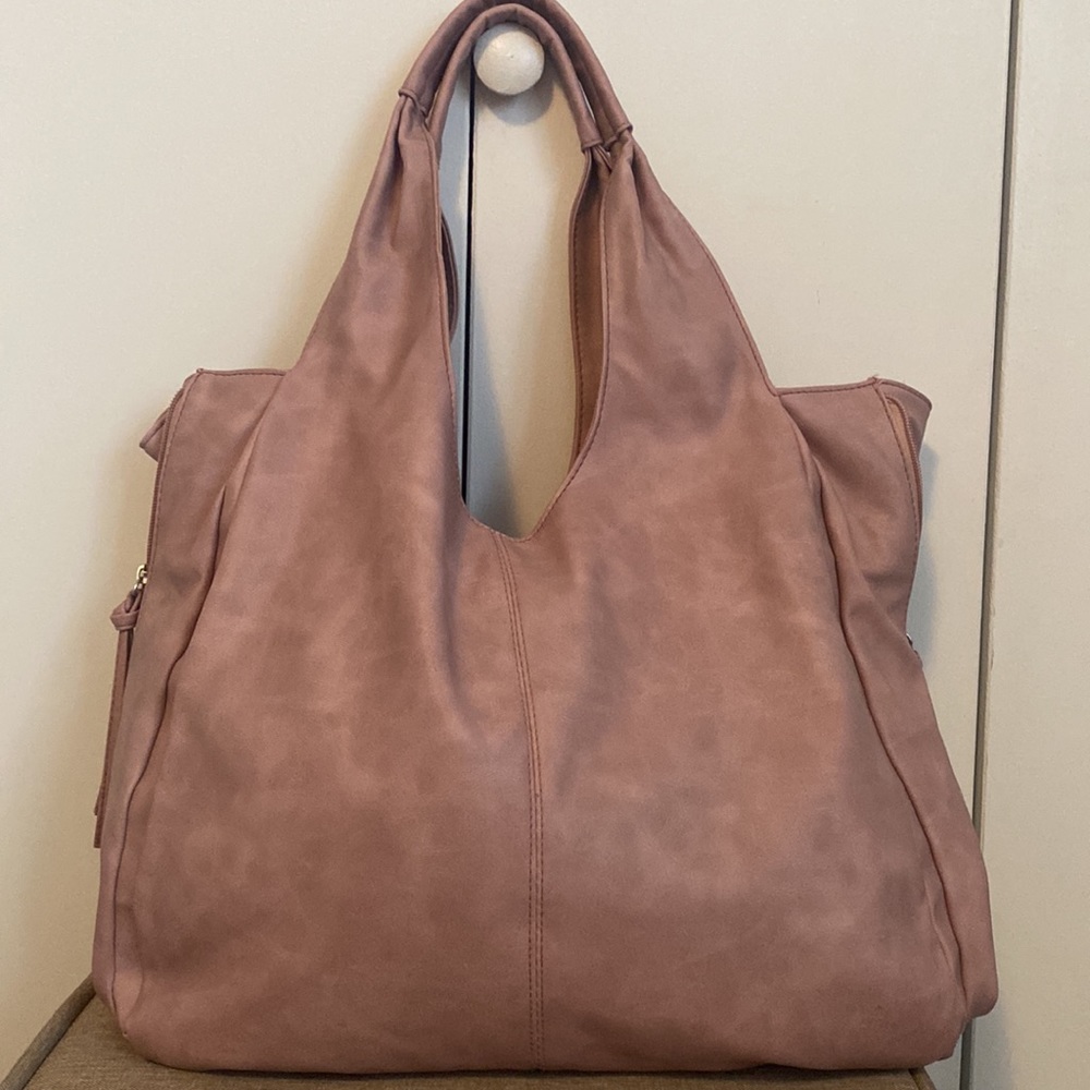 Mauve/ blush hobo handbag. Gently used. Smoke free and pet free home.